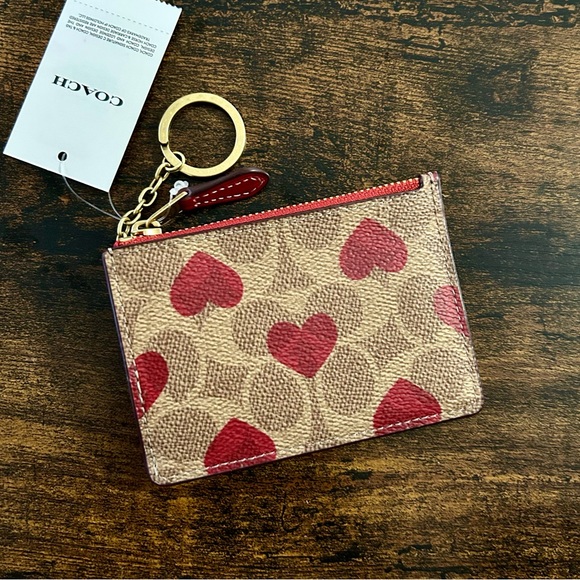 Coach Handbags - Coach Mini Skinny Id Case In Signature Canvas With Heart Print